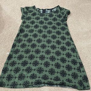 This is a patterned olive green dress